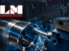 Lowrance Machine logo above a precision metal part being machined on a lathe